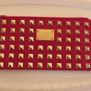 Michael Kors pink studded wristlet